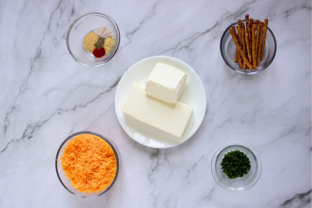 Ingredients of mini pumpkin balls on a white table.