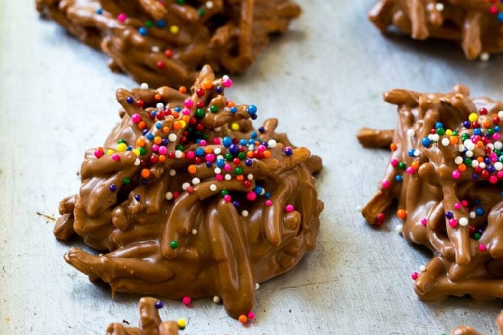 No-bake haystack cookies arranged on a sheet pan.