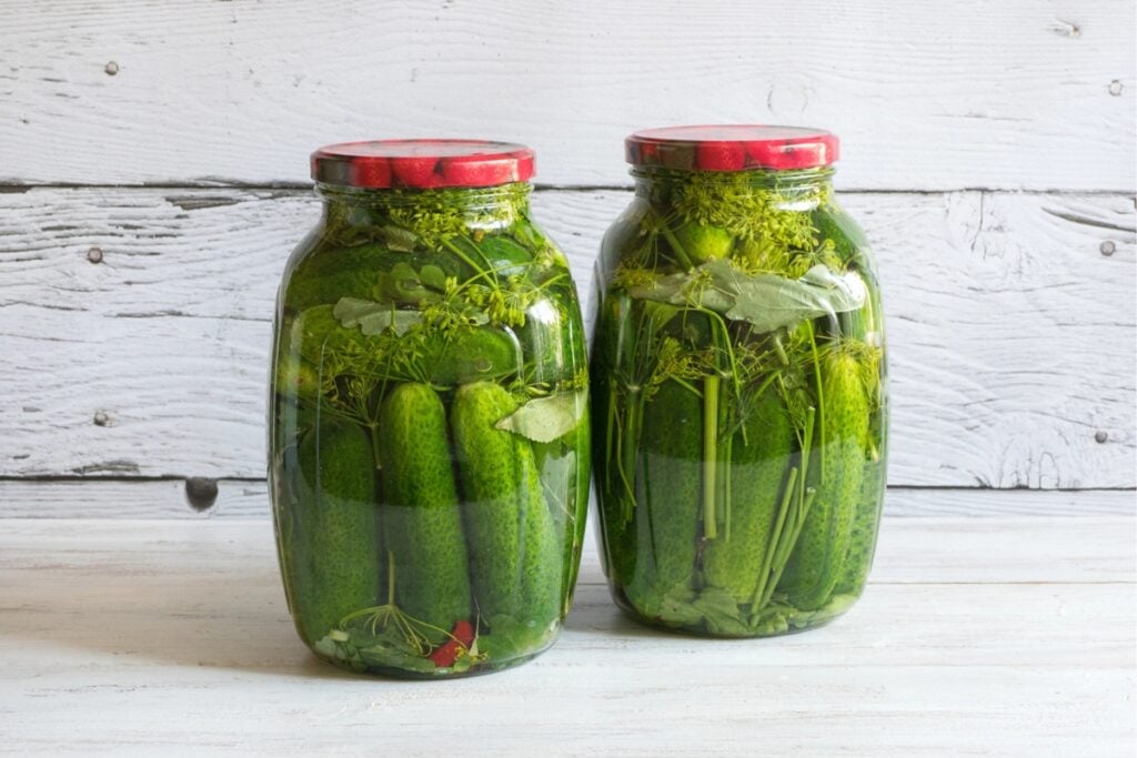 Two jars of cucumber pickles.