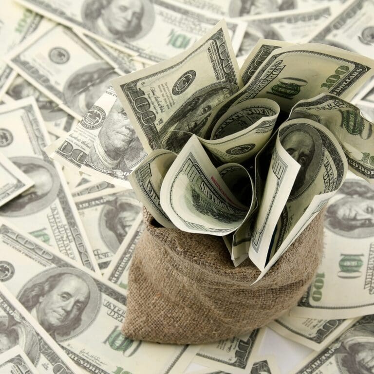 Money bag with $100 bills.