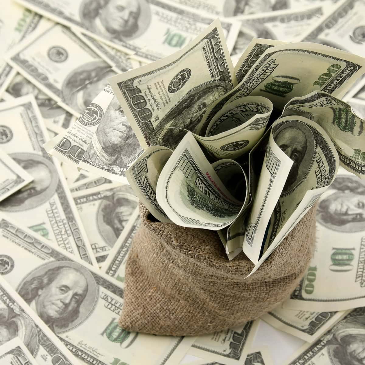 Money bag with $100 bills.