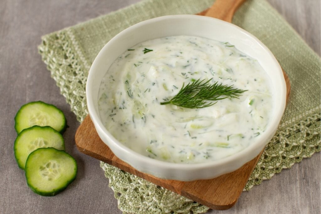 Tzatziki sauce in a white bowl.