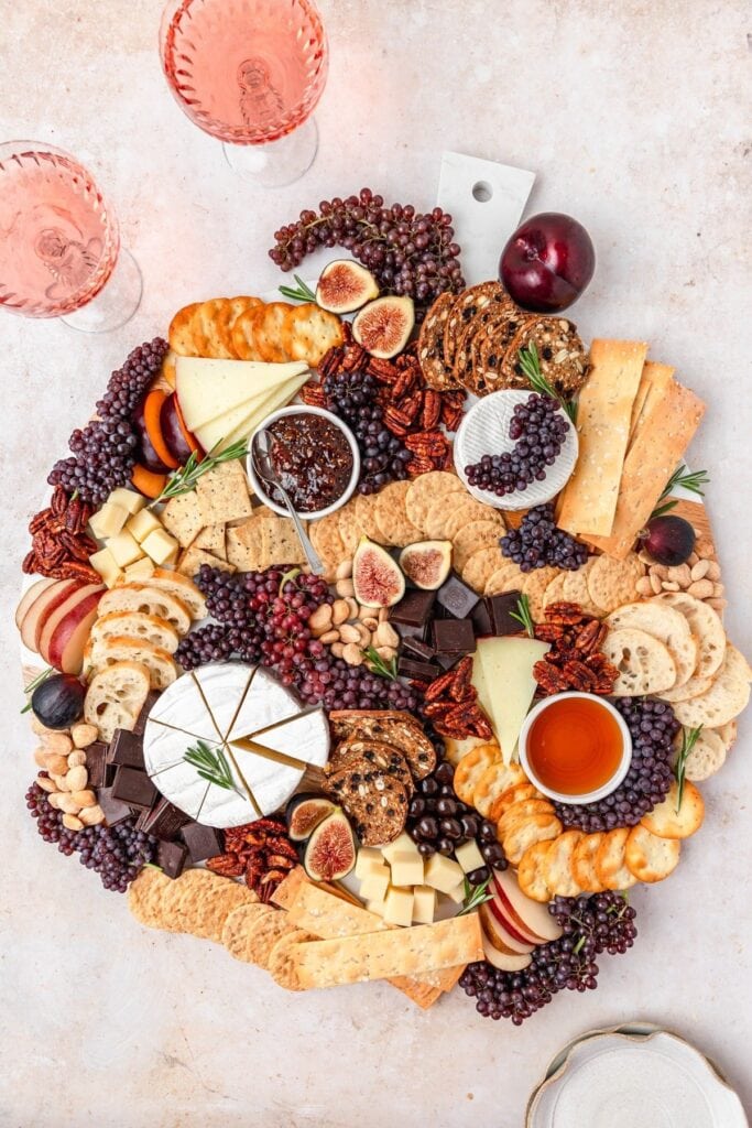 Dessert charcuterie board on a marble surface.