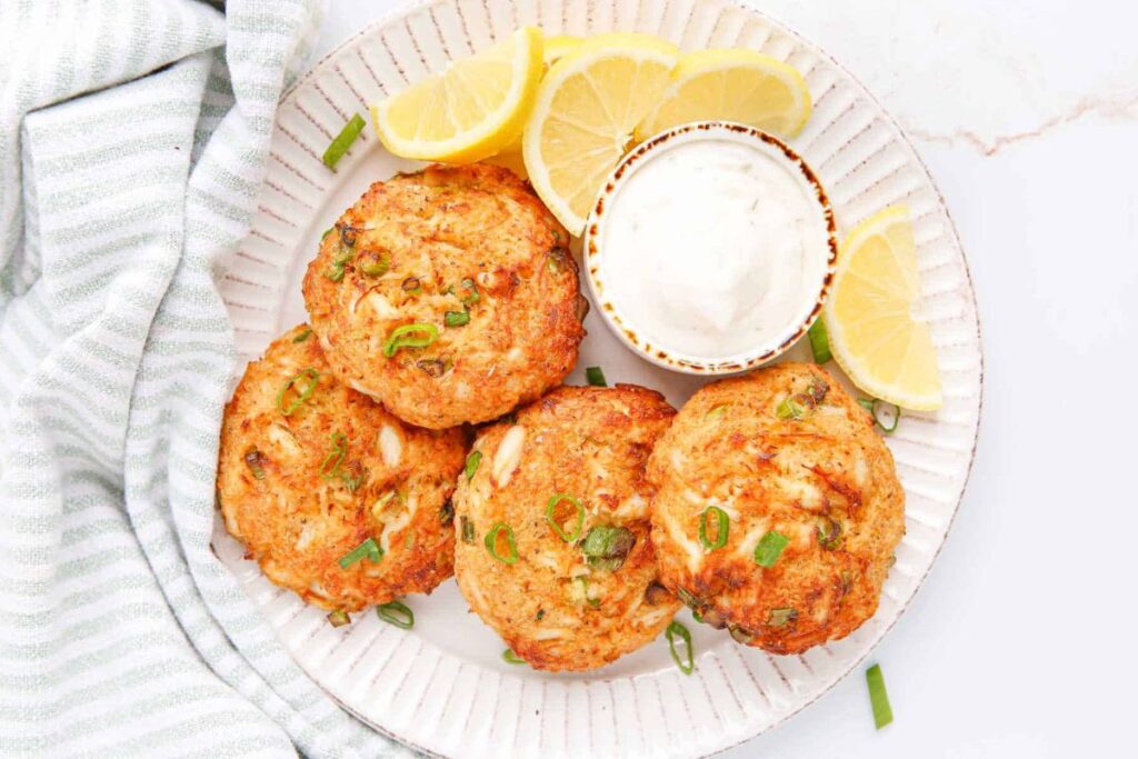 Crab cakes on a plate.