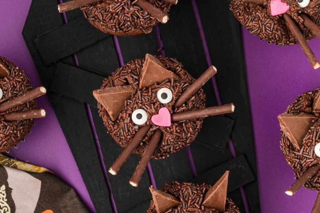 Close up shot of black cat cupcakes.