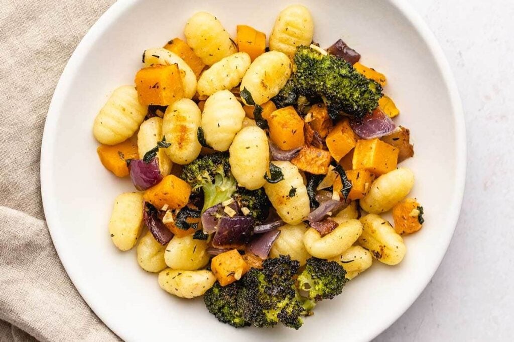 Sheet pan gnocchi on a plate.