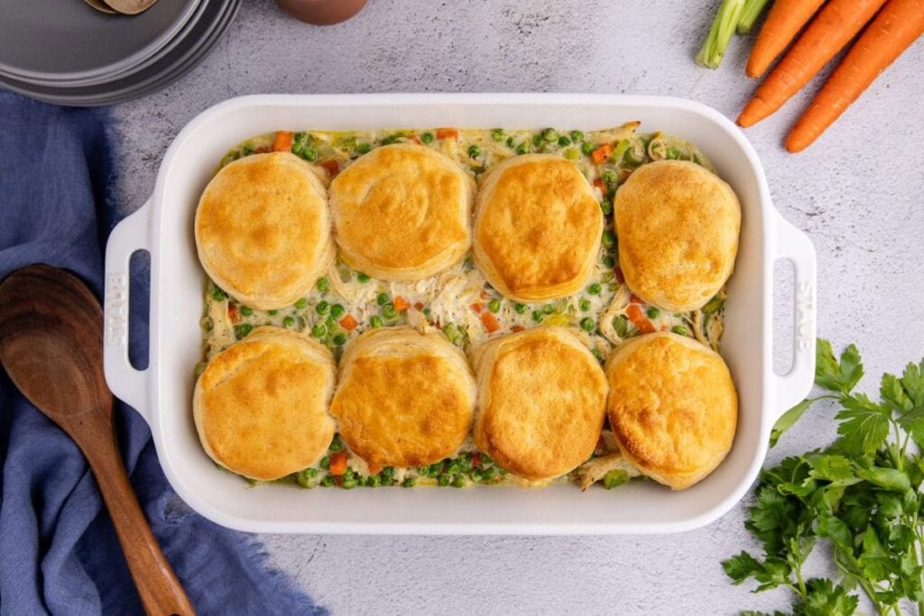 A close up shot of chicken pot pie on a white dish.