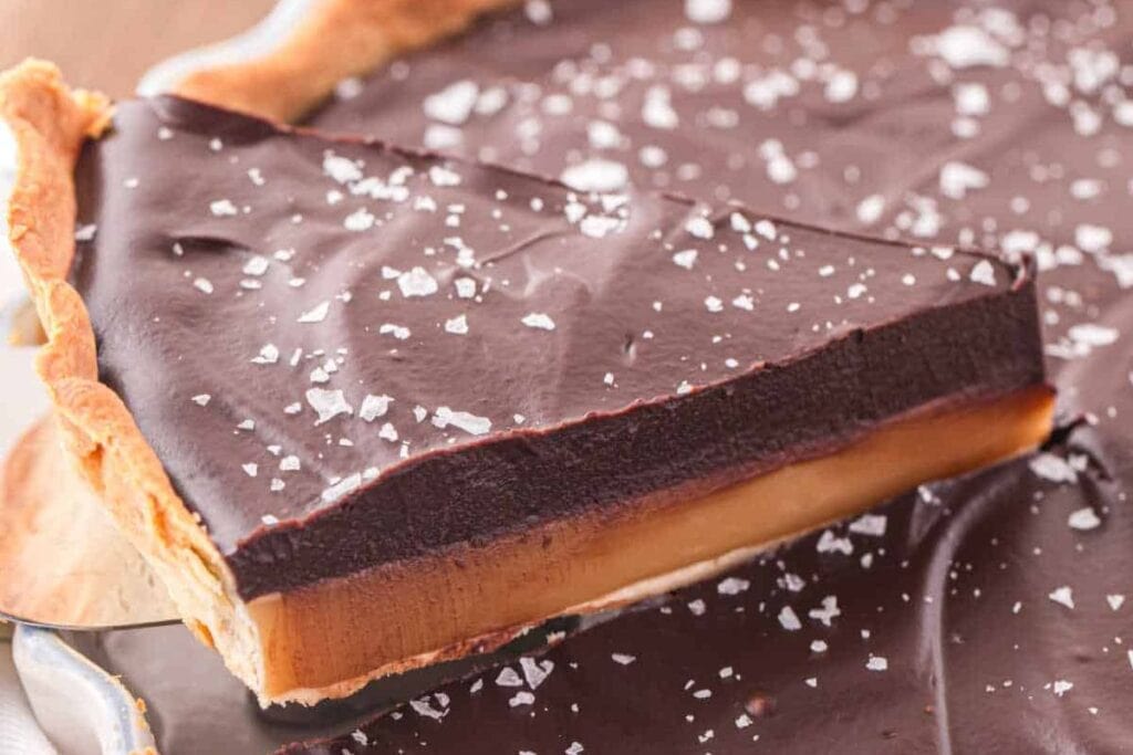 Close up shot of chocolate caramel tart.
