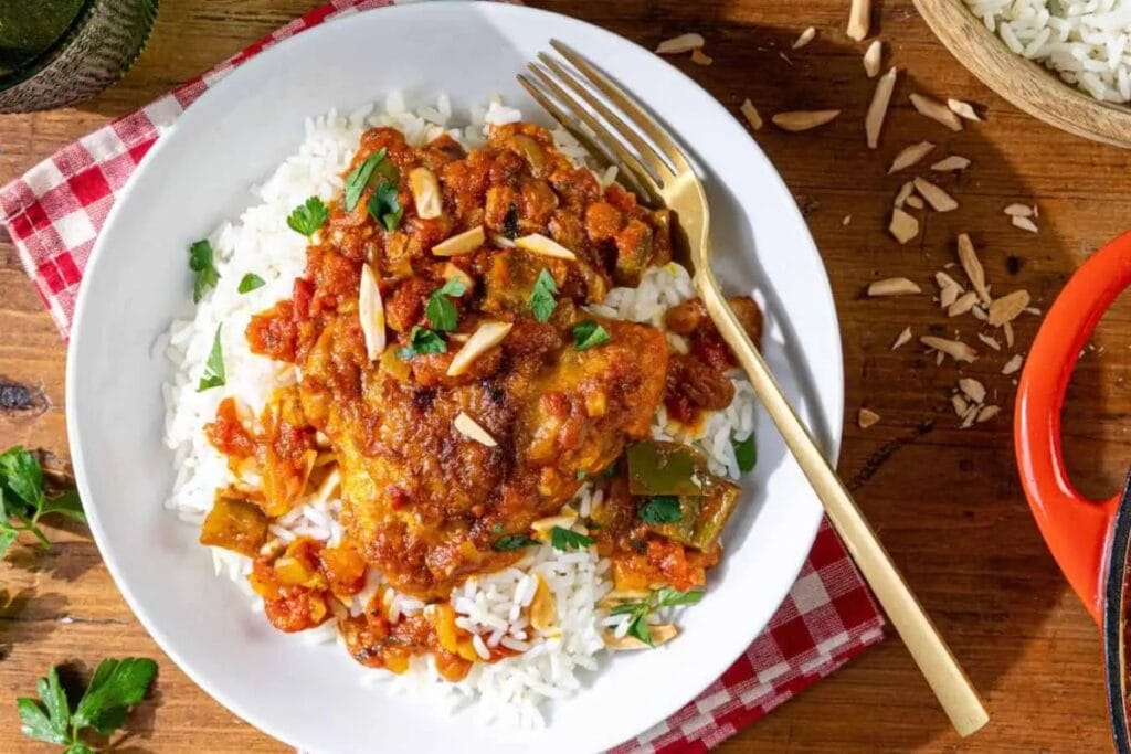 A plate of chicken and rice.