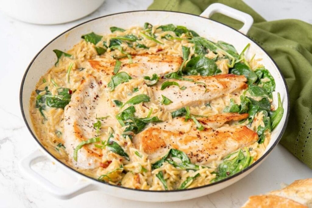 Chicken orzo in a pot.