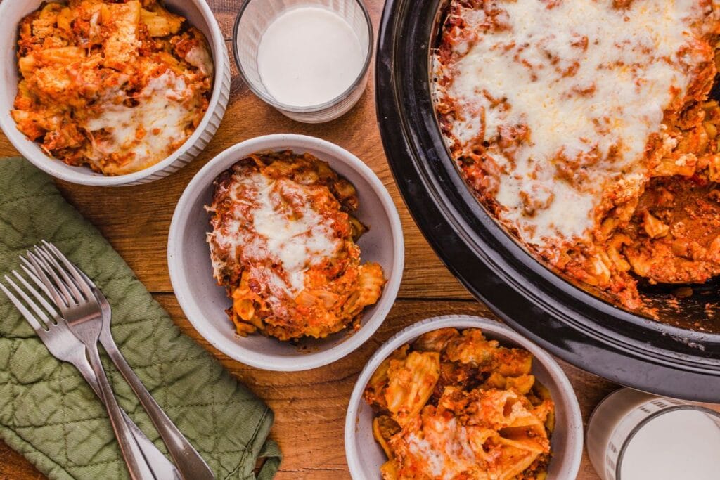 Three bowls of baked ziti.