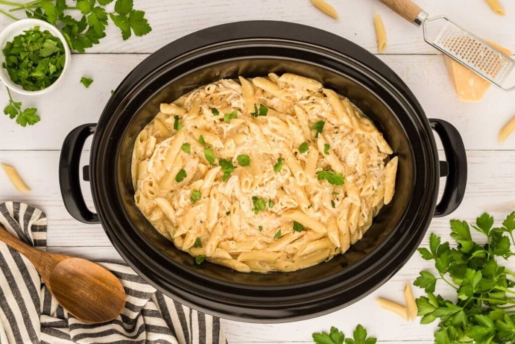 Garlic parmesan chicken pasta in slow cooker.