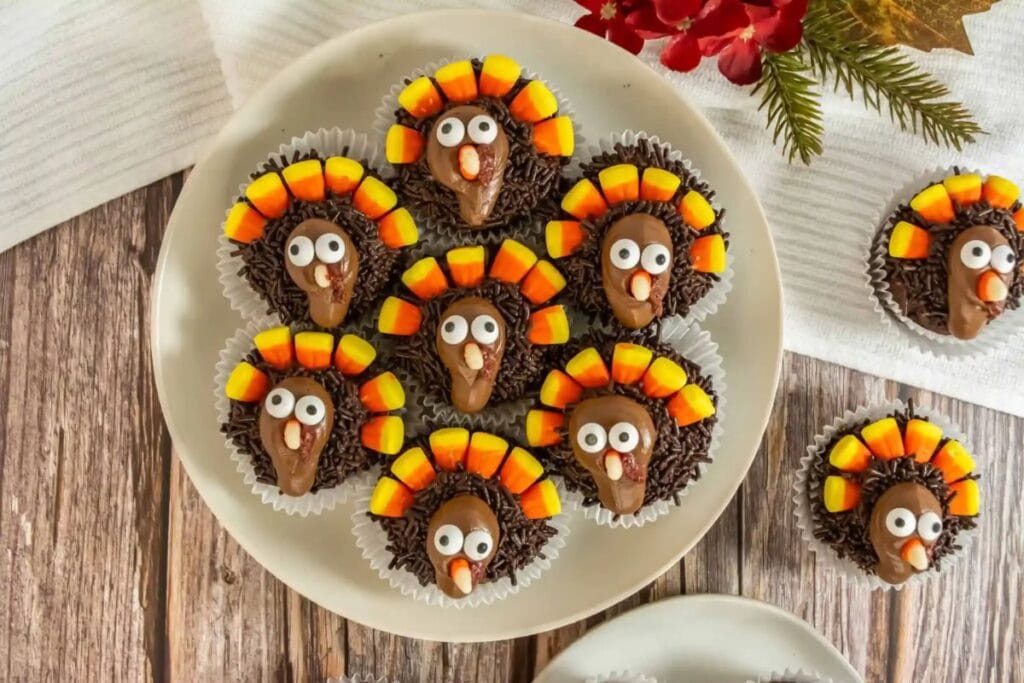 Cute turkey cupcakes on a plate.