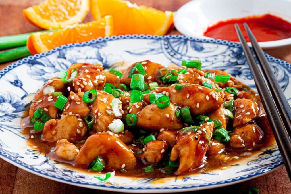 Orange chicken on a plate.