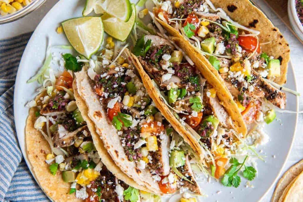 Chicken tacos on a plate.