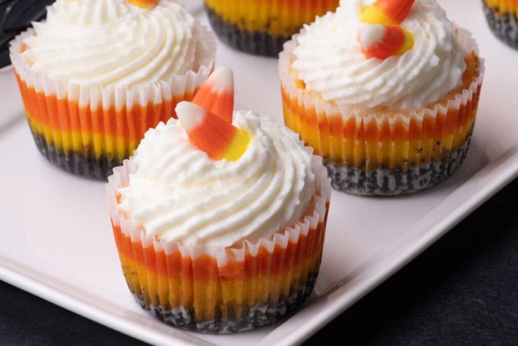 Candy corn cheesecakes close up shot.