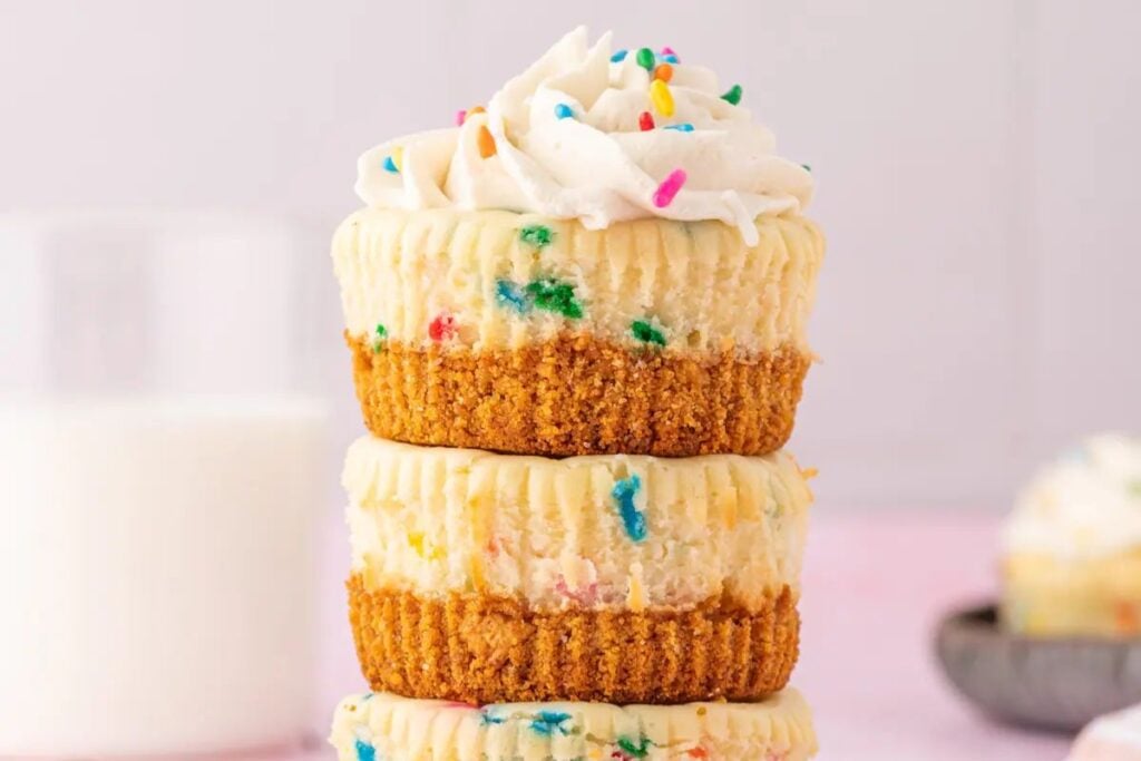 Mini funfetti cheesecakes with sprinkles.