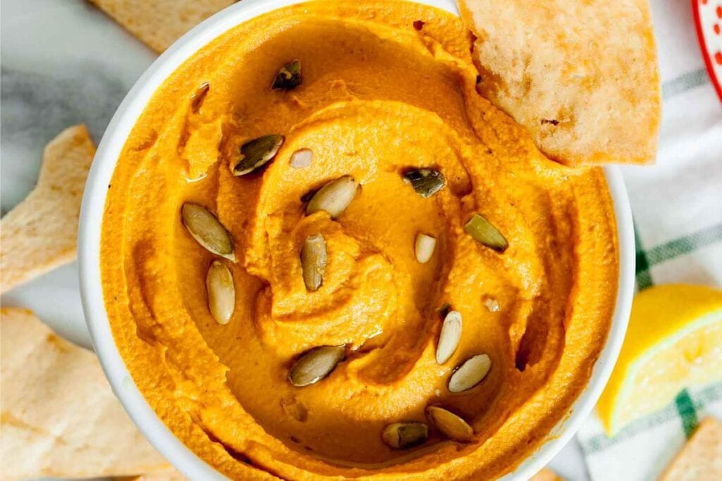 A bowl of pumpkin hummus.
