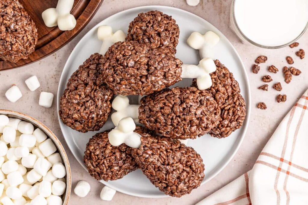 Rice krispie turkey legs on a plate.