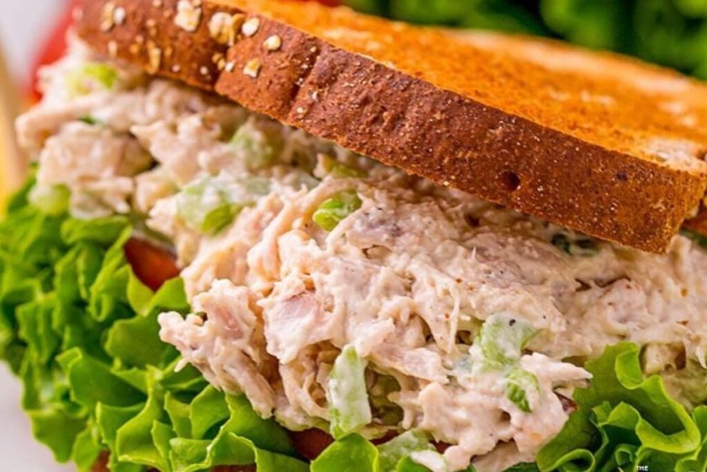 A close up shot of chicken salad.