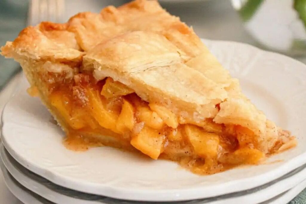 A slice of peach pie.