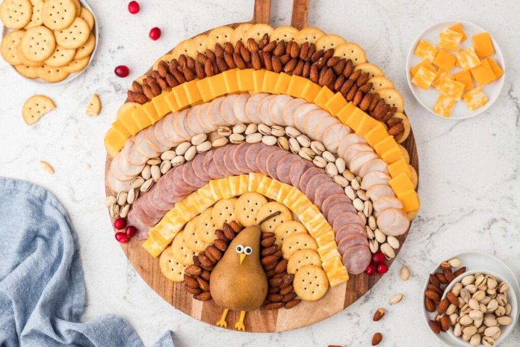 Charcuterie board on a marble surface.