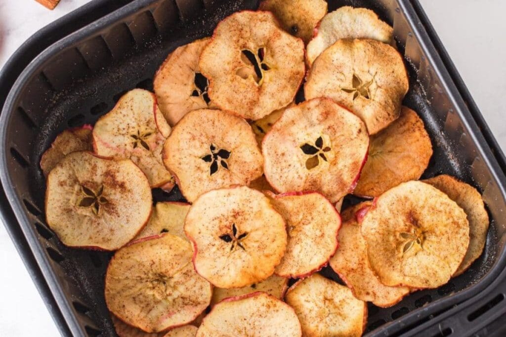 Crispy apple chips in an air fryer.