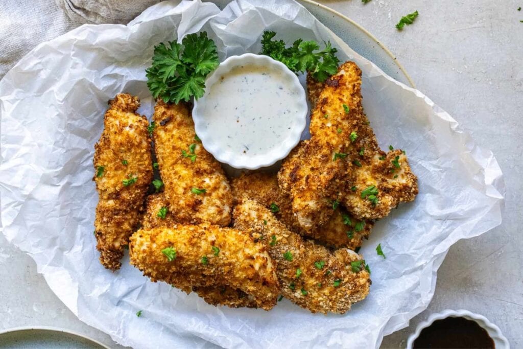 Crispy Air-fried Chicken Tenders served with dressing dip.