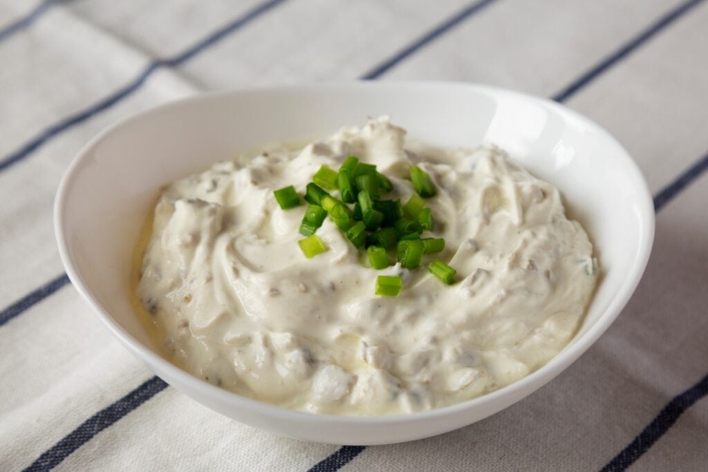 Clam dip served in a bowl.