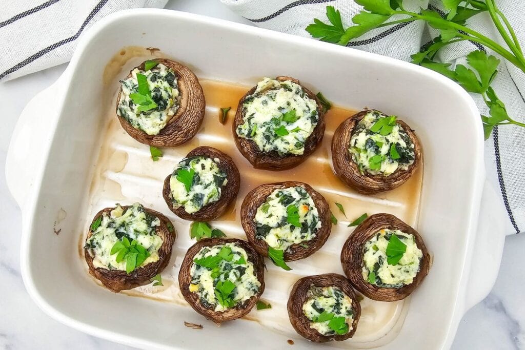 Stuffed mushrooms in white dish