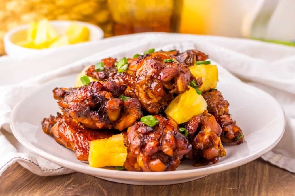 Hawaiian wings on a white plate.