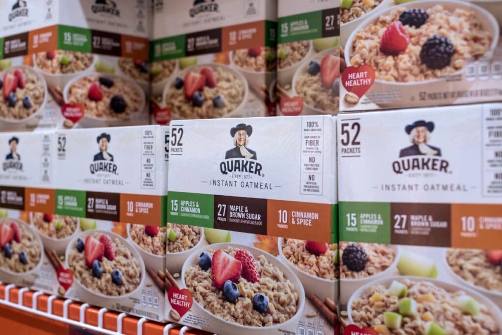 Instant oatmeal packets displayed on a shelf.