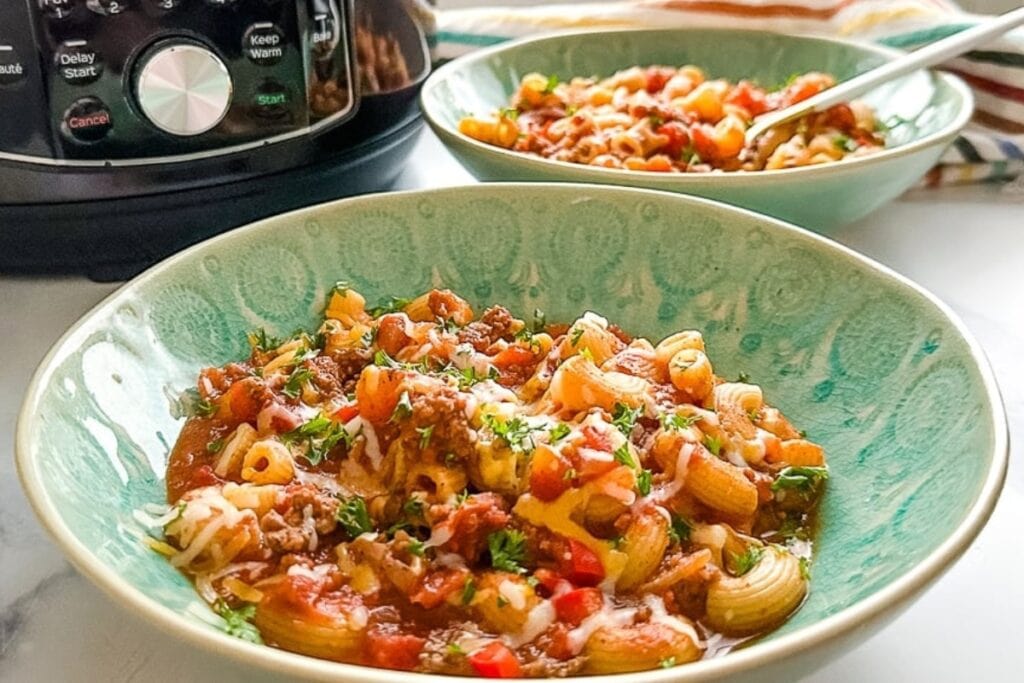 Instant Pot chili mac served in a bowl.