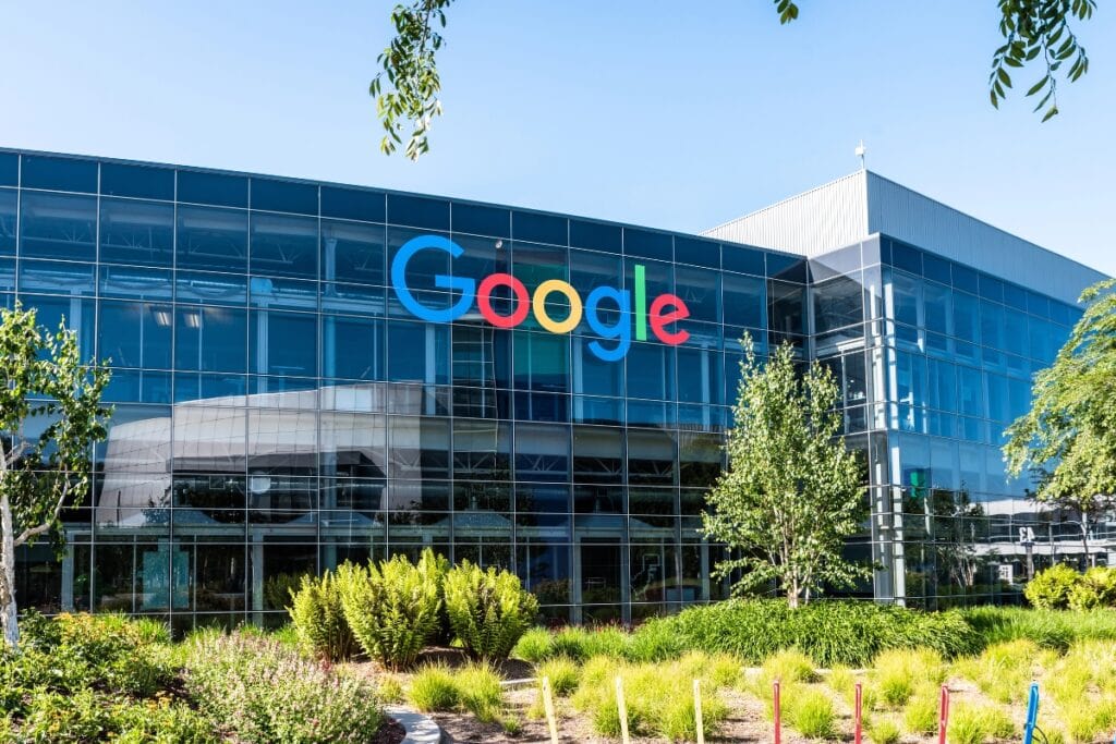 Google headquarters building with modern glass architecture.