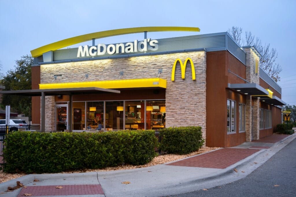 Front of McDonald’s restaurant with visible logo and signage.