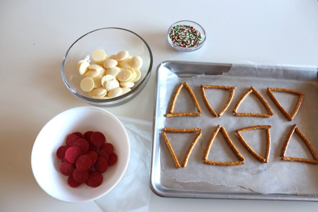 Process shot of Christmas tree pretzels.