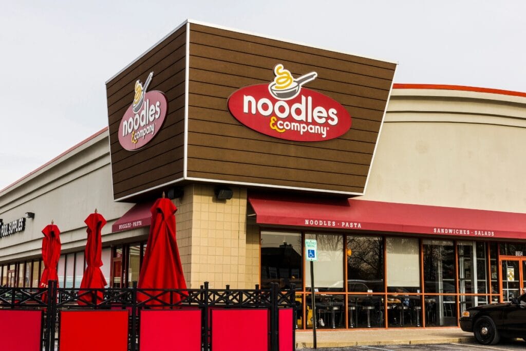 Exterior view of Noodles & Company fast food restaurant.