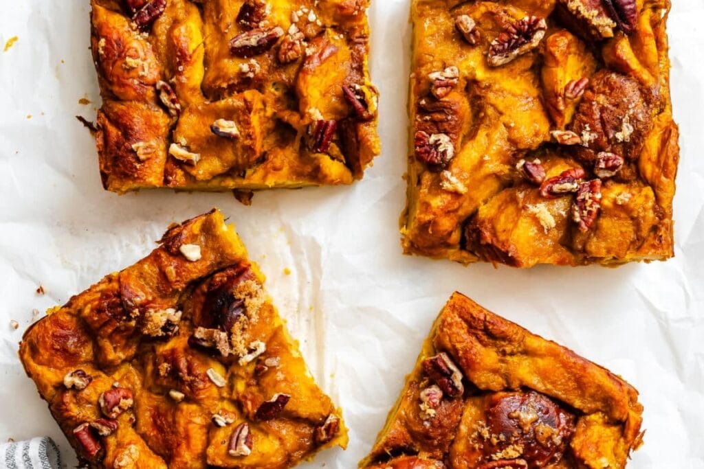 Pumpkin bread pudding on parchment paper.