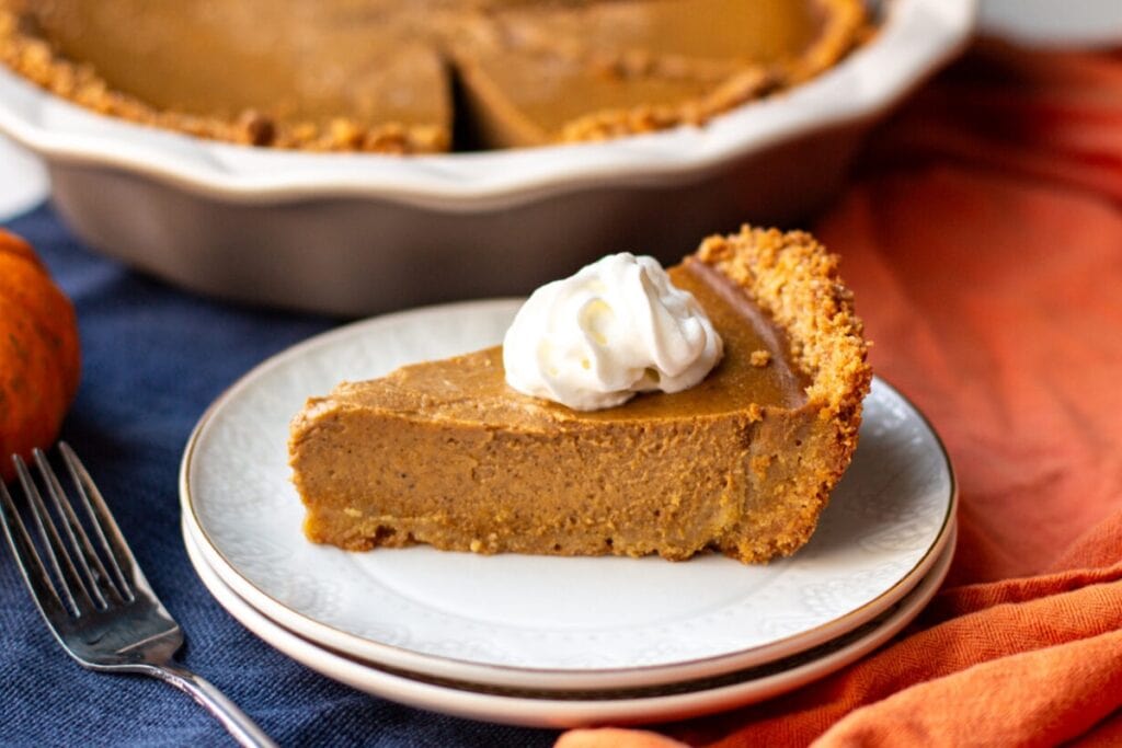 Pumpkin pie on a plate.