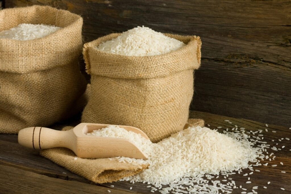 Two bags filled with uncooked white rice