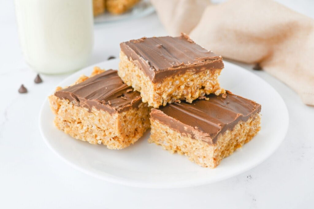 Scotcheroo bars on a plate.