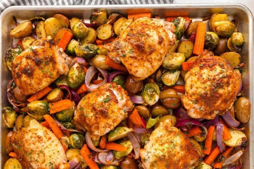 Chicken thighs on sheet pan.