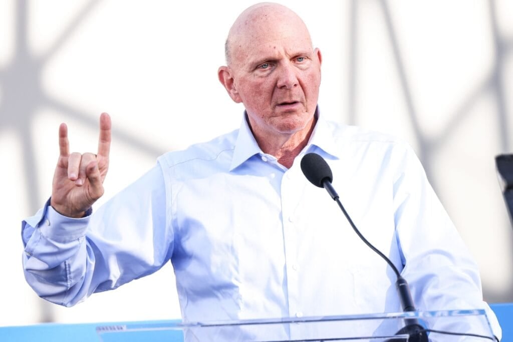 Steve Ballmer on stage with a mic.