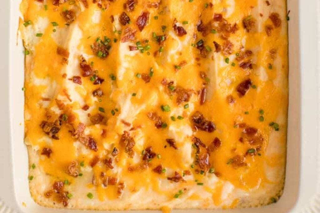 Twice-baked potato casserole in a baking dish.