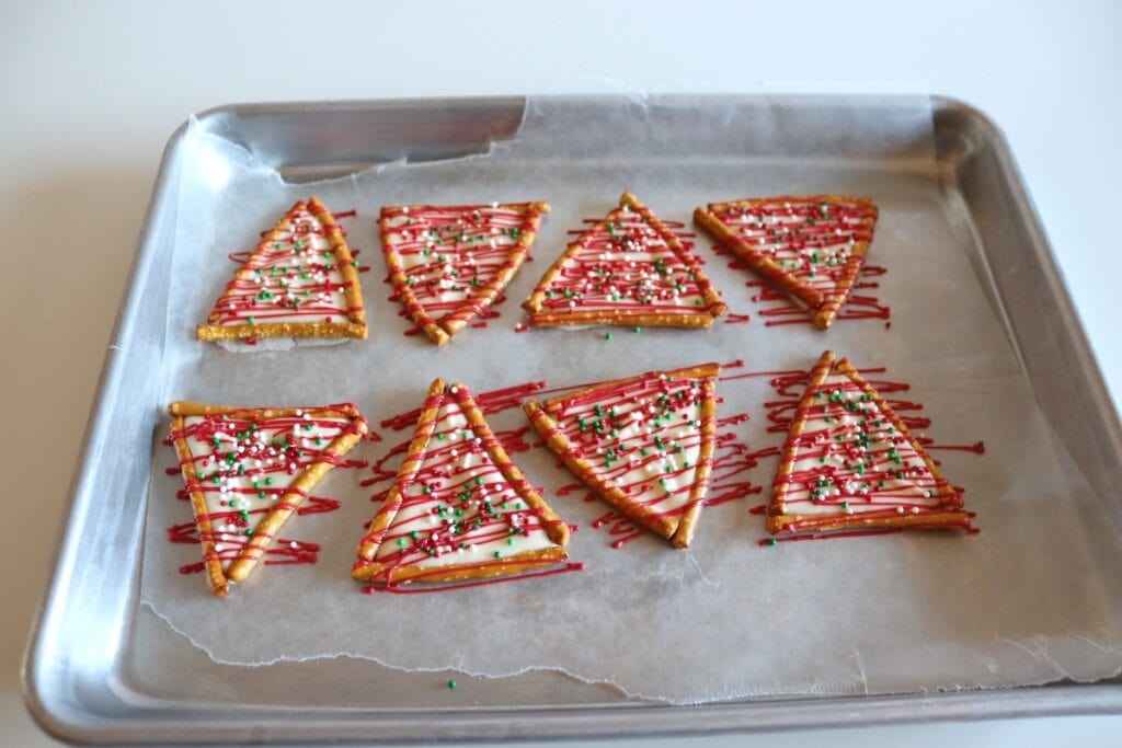 Process shot of Christmas tree pretzels.