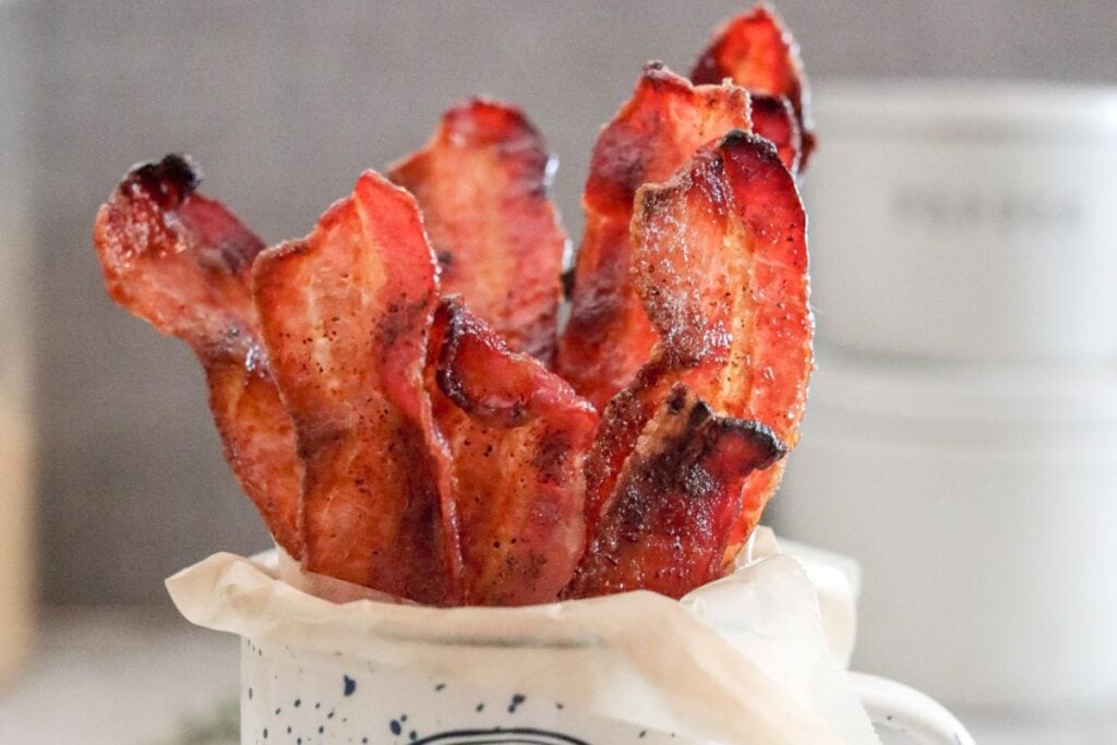 A close up shot of candied bacon.