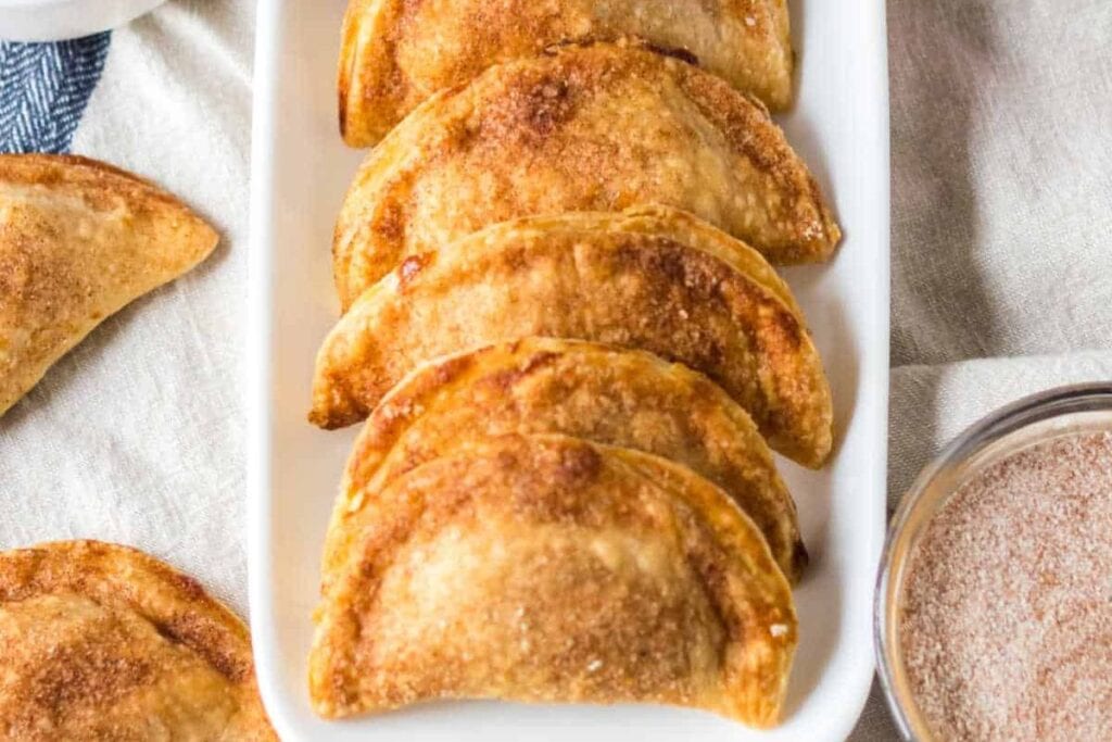 A close up shot of caramel apple empanadas.