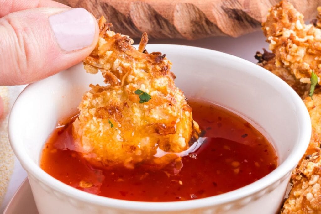 A close up shot of coconut shrimp.