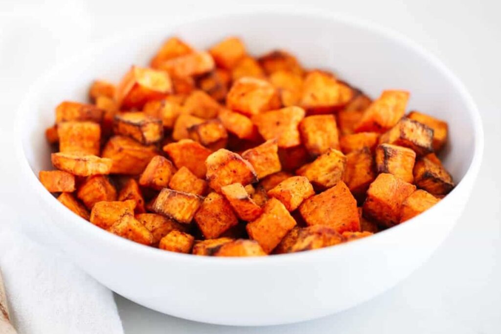 A close up shot of sweet potato cubes.