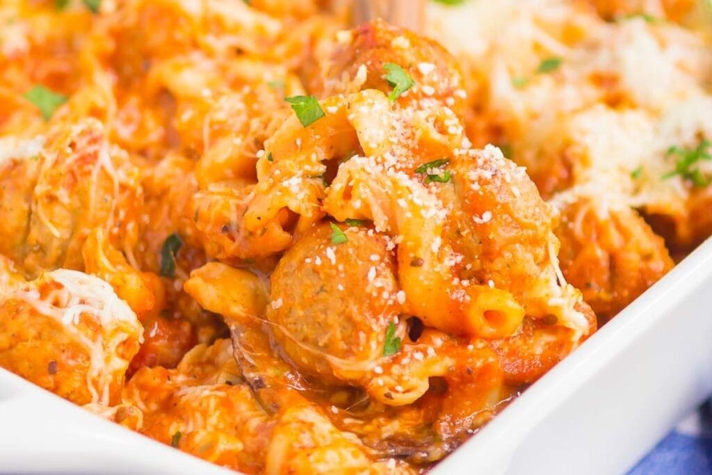 A close up shot of cheesy meatball casserole.